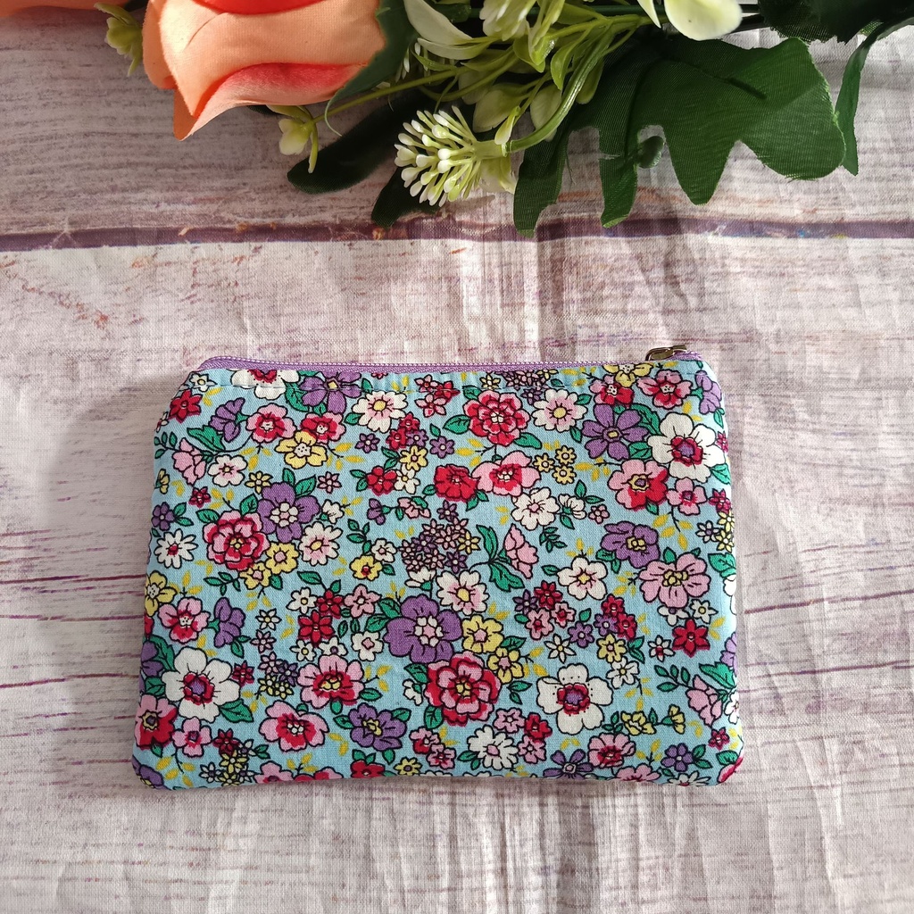 Monedero tela con estampado de flores