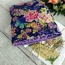 funda de libro hecha a mano con estampado floral azul