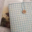 Eestuche para libro de tela acolchado hecho a mano