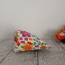 Neceser mediano para maquillaje con estampado floral alegre