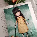 estuche para libro de tela acolchada con ilustración de niña y zorro