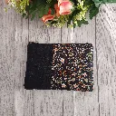 Neceser hecho a mano con estampado floral y tela vaquera