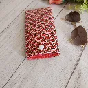 Funda gafas tela con un interior en combinación con tela exterior.