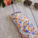 Funda de gafas de tela con estmpado de flores malva y naranja