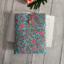 Funda de libro floral turquesa hecha a mano